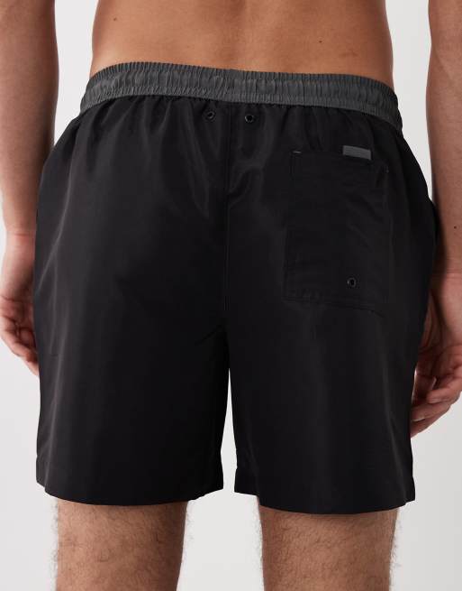 River Island – Badeshorts in Schwarz mit Farbblockdesign , 4 von 5