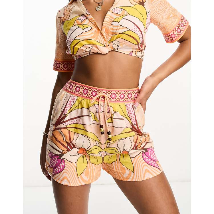 River Island beach short co ord in orange tropical print ASOS