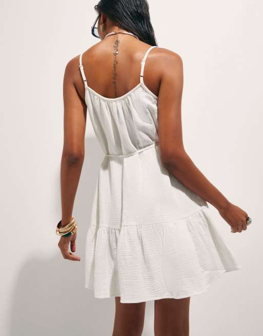 river island white beaded dress Women's Breezy Blue & White Flowy Maxi Dress with Cross Strap Detail   Lotus Corner