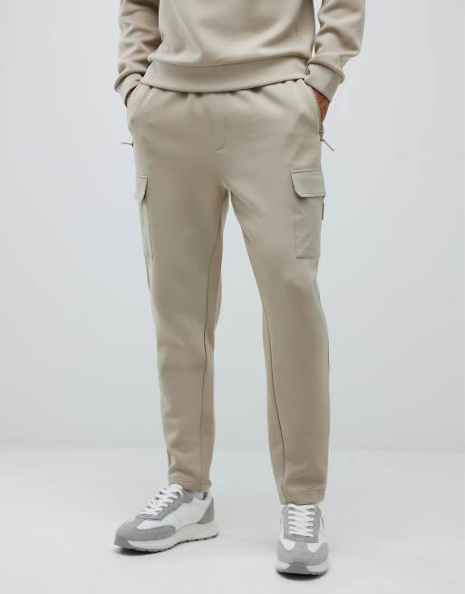 River Island Beige slim fit nylon hybrid joggers in stone - dark