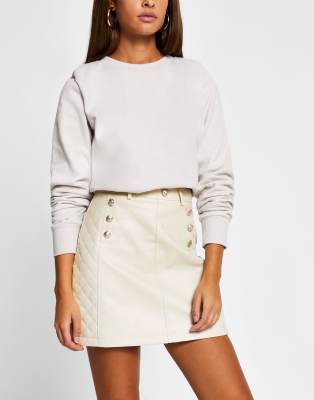 River Island belted quilted faux leather mini skirt in beige-Neutral