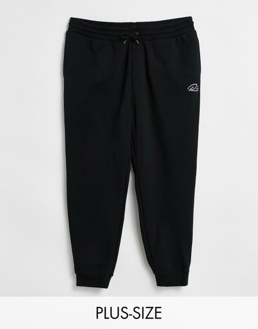 River Island Big & Tall script slim trackies in black