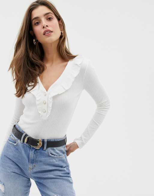 River Island - Body bianco con volant sul davanti