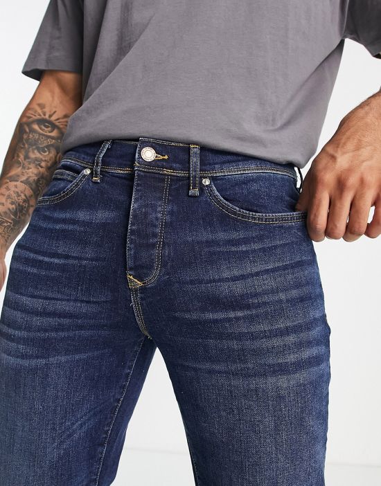 https://images.asos-media.com/products/river-island-bootcut-jeans-in-dark-blue/203182104-3?$n_550w$&wid=550&fit=constrain