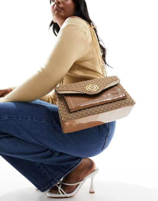 River Island - Borsa da spalla marrone con stampa mista