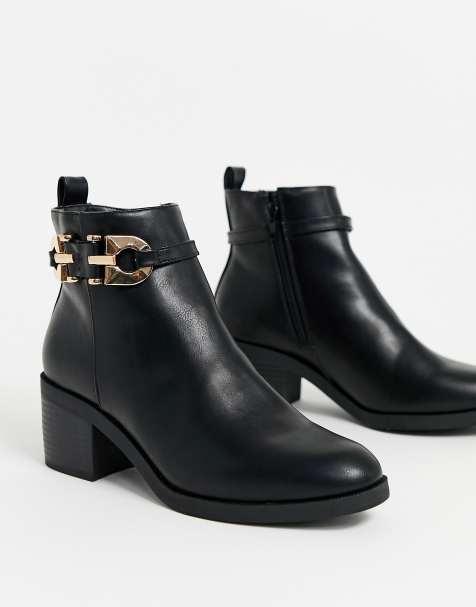 River Island - Bottes en similicuir avec détails métalliques - Noir