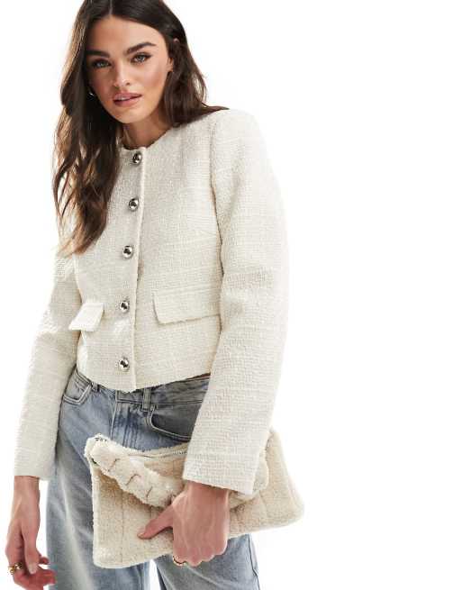 River Island Boucle crop trophy jacket in cream | ASOS