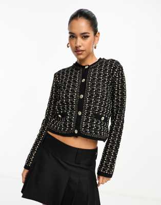 River Island - Bouclé-Strickjacke in Schwarz