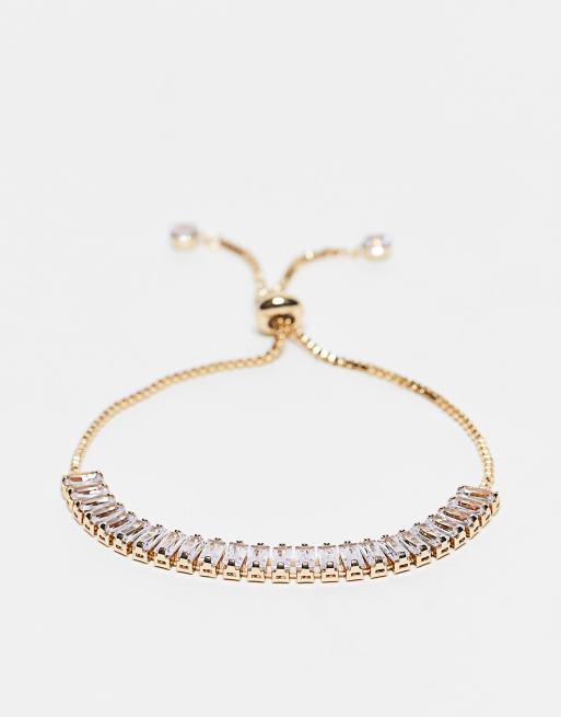 River Island - Bracciale regolabile color oro con zirconia cubica 