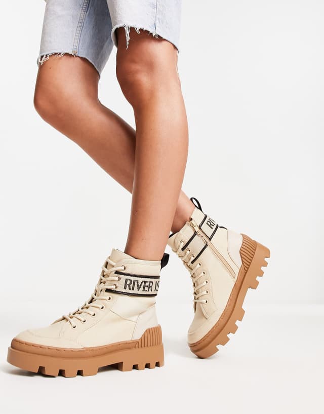 River Island branded canvas boots in beige