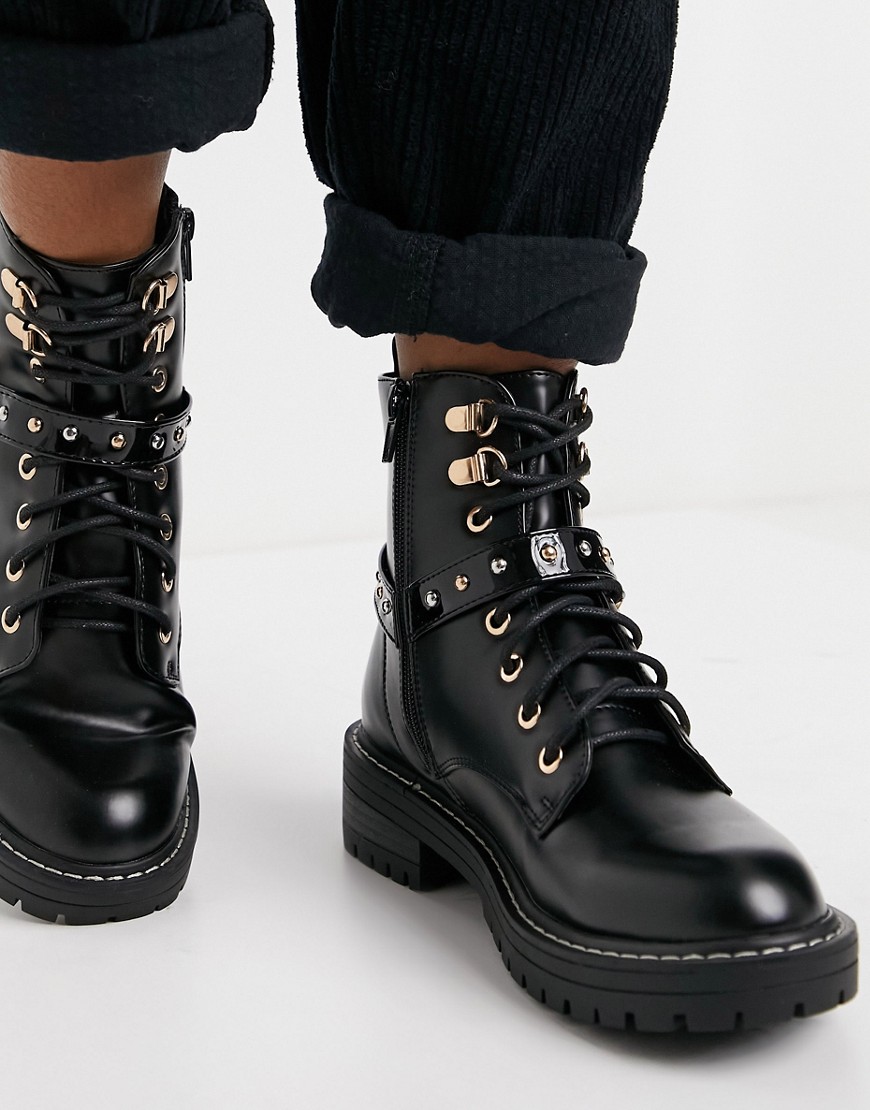River Island branded harness detail boots in black