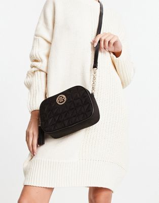 branded quilted cross body bag in black