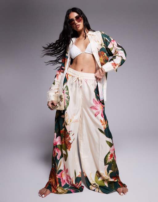 River Island - Broek met botanische print en wijde pijpen in crème, deel van co-ord set
