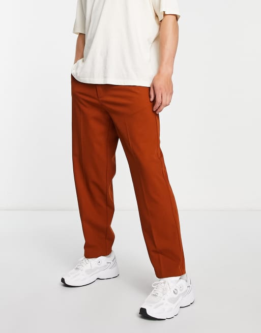 River Island - Broek met wijde pijpen in roestbruin