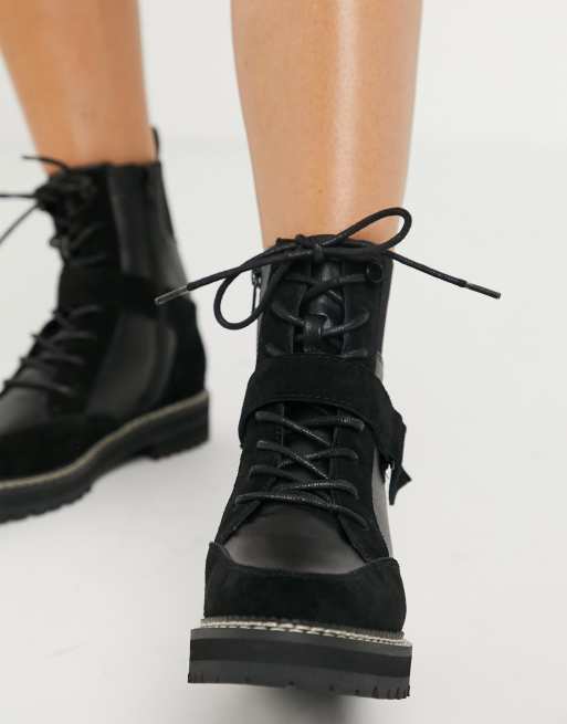 Black boots outlet with white stitching