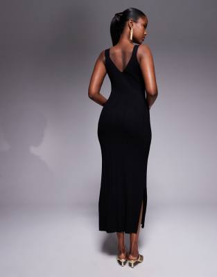 Vestido negro con detalle de hebilla de River Island