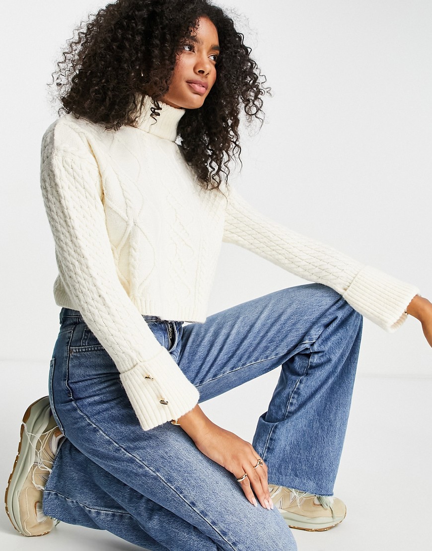 River Island cable knit cropped funnel neck sweater in cream-White