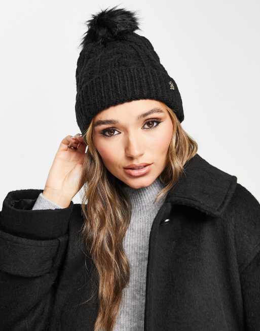 River Island cable knit pom pom beanie in black | ASOS