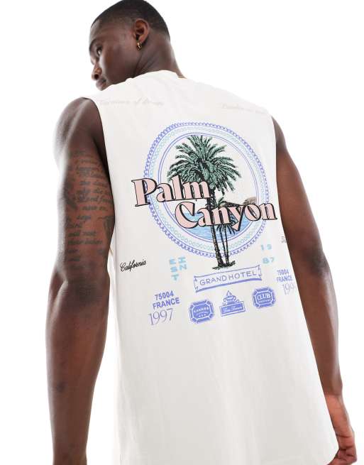 River Island - Canotta oversize color écru con scritta 