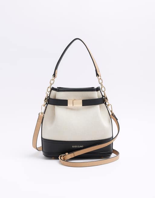 River Island Canvas buckle cross body bag in cream