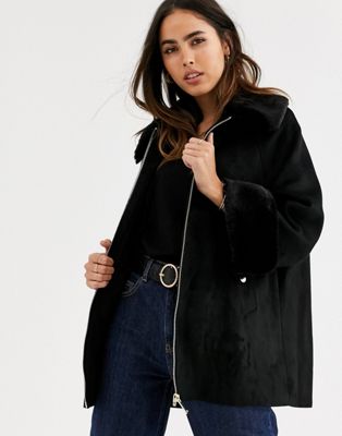 River Island cape with faux fur cuffs in black | ASOS