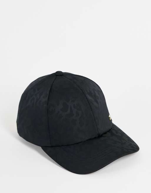 River Island - Cappellino in jacquard nero con stampa leopardata