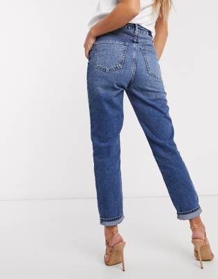 mid blue high rise mom fit ripped jeans