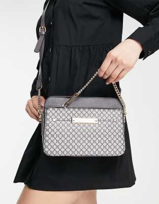 River Island cross body bag with monogram detail in black