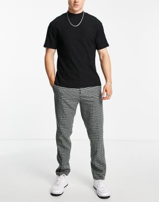 grey check pants with black shirt