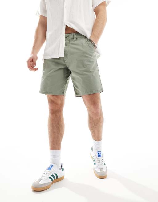 River Island – Chinoshorts in grüner Waschung