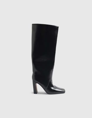  Chisel toe high leg boots 