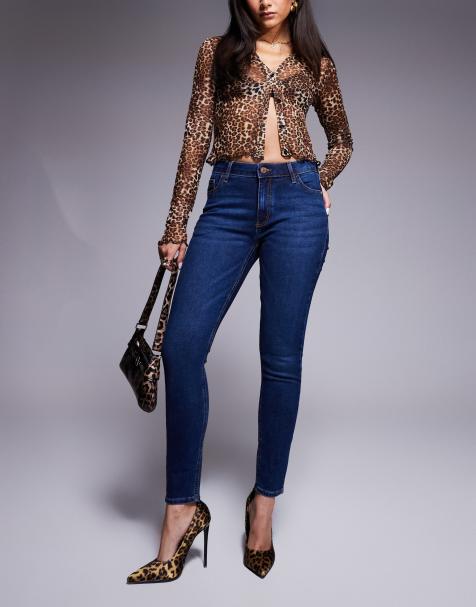 River Island – Ciemnoniebieskie dopasowane jeansy ze średnim stanem - view 1
