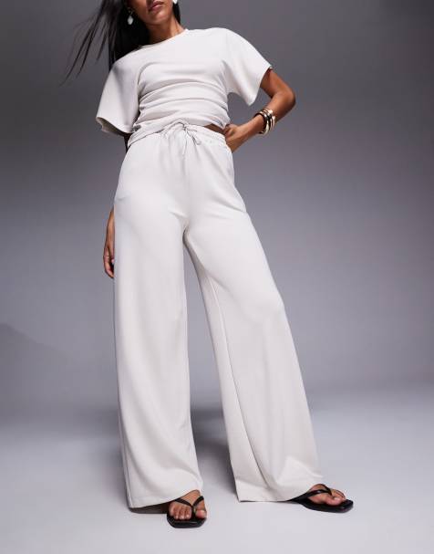 River Island clean wide leg trackies in black - view 1