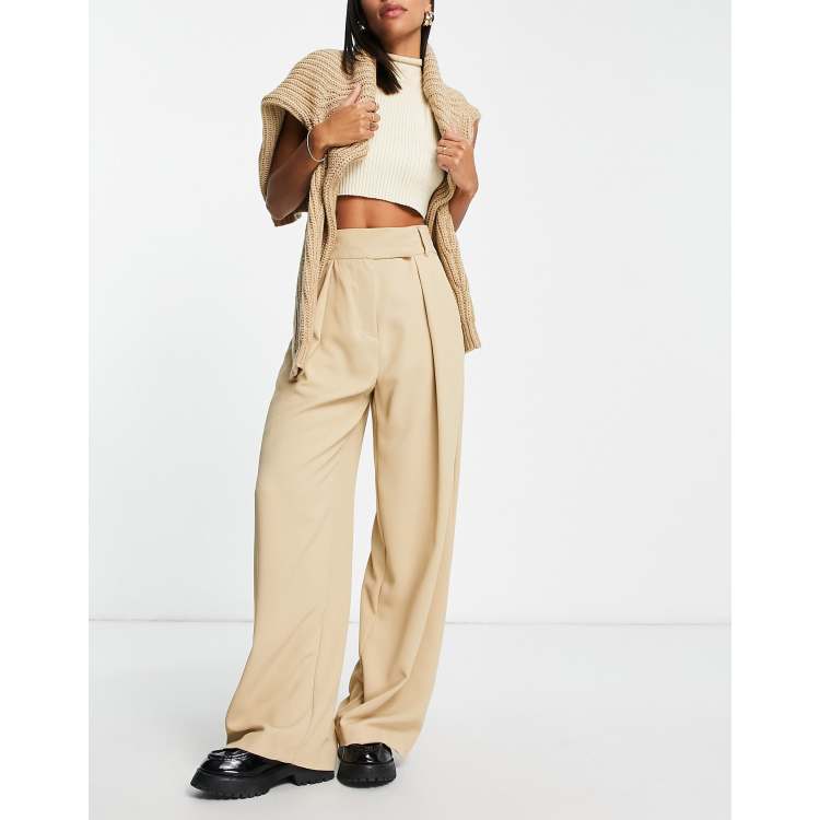 Beige wide leg pleated trousers