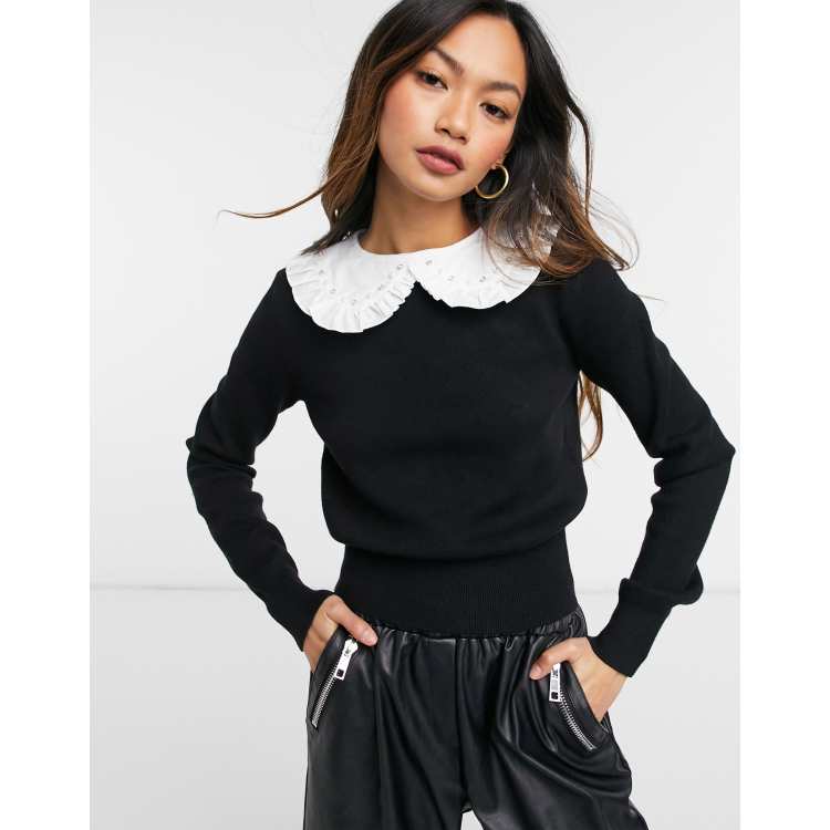 Black jumper with outlet white collar