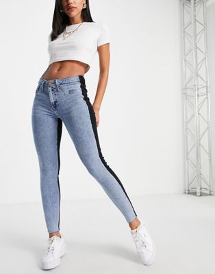 River Island colourblock mid rise skinny jeans in black and blue