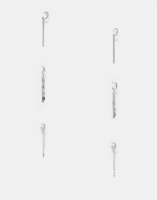 River Island - Confezione da 3 orecchini color argento con pendente a catenina con scritta 
