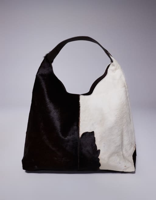 River Island cow print leather 'hair on' slouch bag in dark brown, 2 of 4