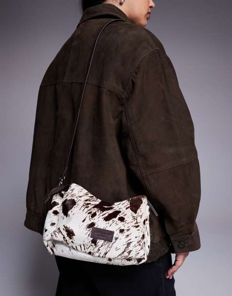 River Island cow print leather pony hair crossbody bag in brown - view 1