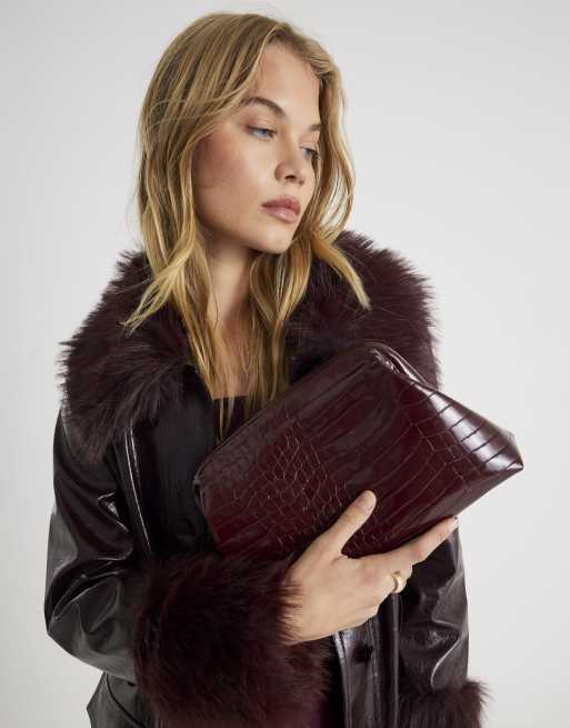 River Island Croc textured patent clutch bag in red dark ASOS