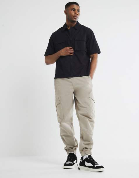 River Island cuffed cargo trousers in medium stone - view 1