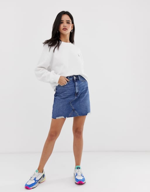 River Island denim mini skirt in mid wash | ASOS