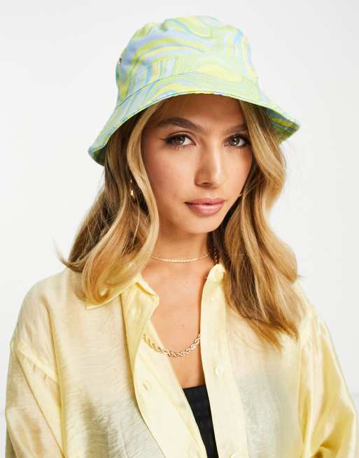 River Island denim print bucket hat in light blue | ASOS