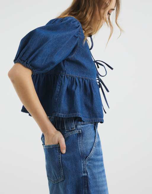 River Island denim puff sleeve top in mid blue ASOS