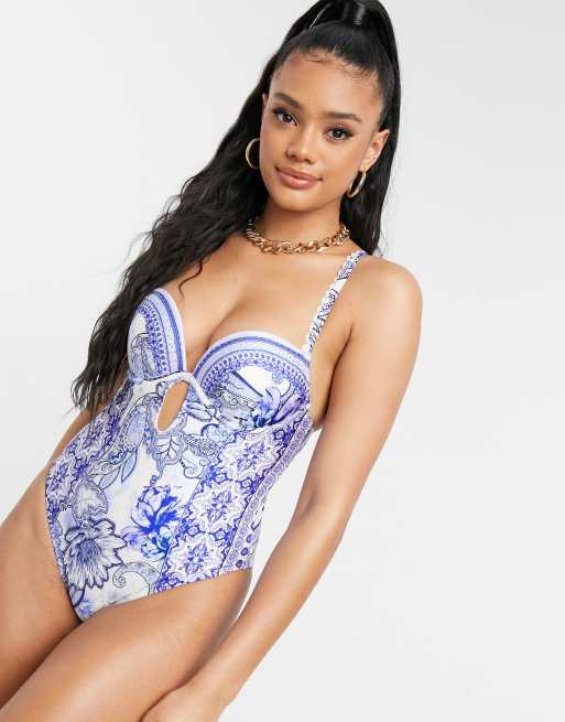 River Island - Diepuitgesneden badpak met bloemenprint in blauw