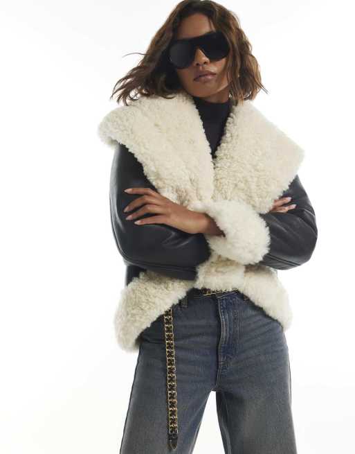 River Island Dip hem faux shearling jacket in black, 2 of 4