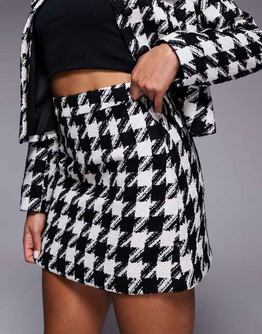 River Island dogtooth boucle mini skirt in black ASOS