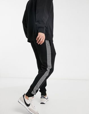 River Island dogtooth check jogger in black (22660086)