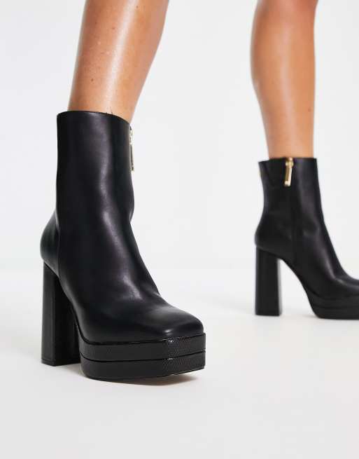 Black heeled 2024 boots river island