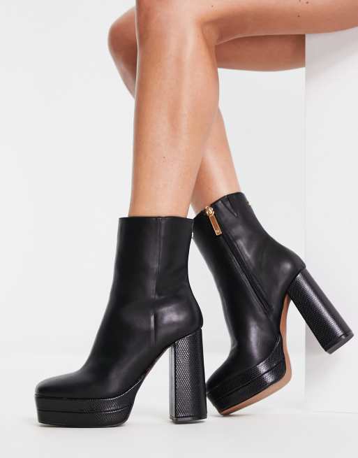 Black heeled platform deals boots